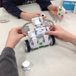 Image of students working with robotics